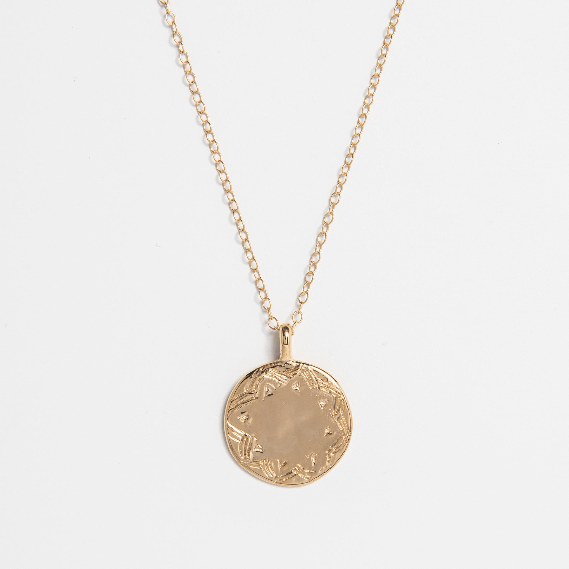 Frida Kahlo Folk Art Disc Necklace in 18ct Gold Vermeil, featuring a carved folk art motif. Handcrafted from recycled sterling silver