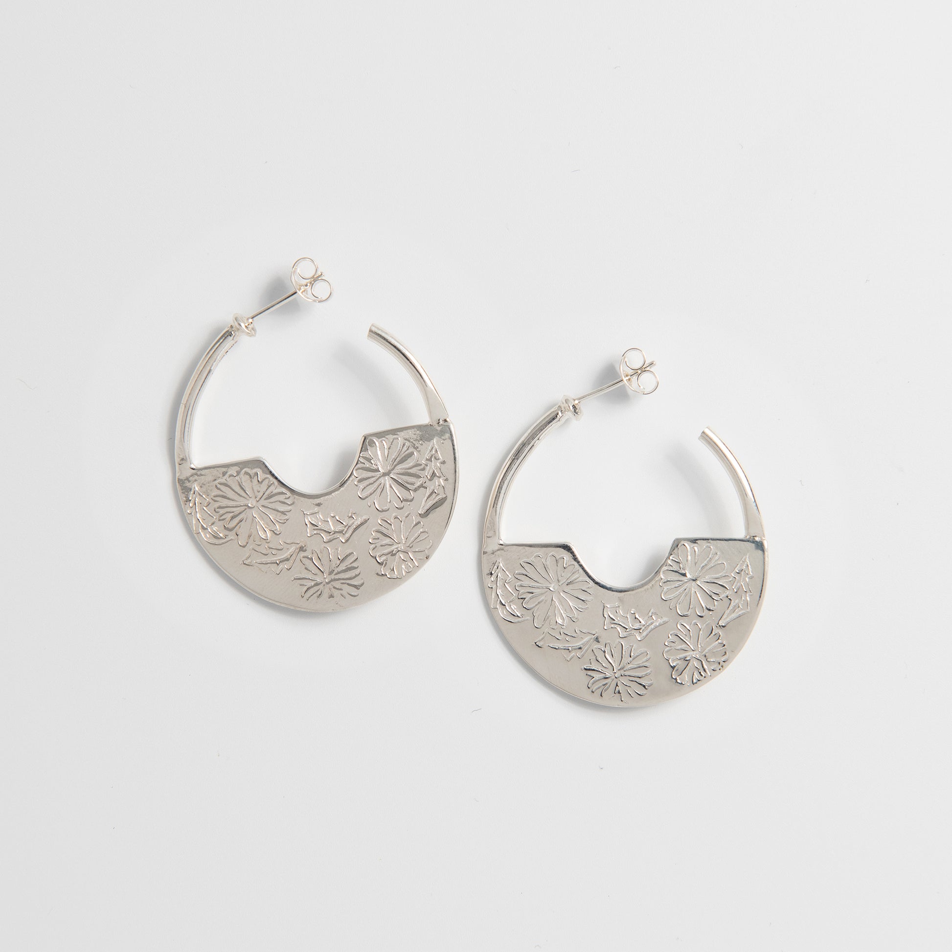 Sterling silver Marigold Creole Hoop Earrings inspired by Frida Kahlo’s artistry. Elegant statement jewellery perfect for festivals and weddings.