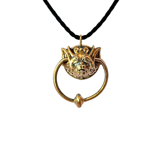 Licensed To Charm Labyrinth Right Door Knocker bronze necklace pendant on black adjustable cord