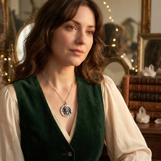 Official Labyrinth Sir Didymus sterling silver necklace inspired by the 1986 Labyrinth film, handmade in the UK and presented on a trace chain worn by model with green waistcoat