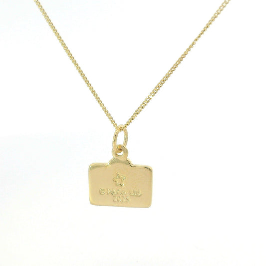Licensed To Charm Close-up of mini luggage pendant with raised bow and character detail in 18ct Gold Vermeil.