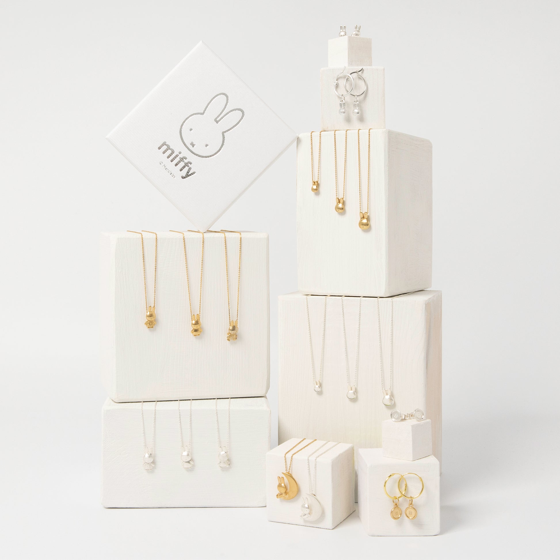 Licensed To Charm Miffy Jewellery Collection in sterling silver with gift box showing our necklaces in gold vermeil and sterling silver
