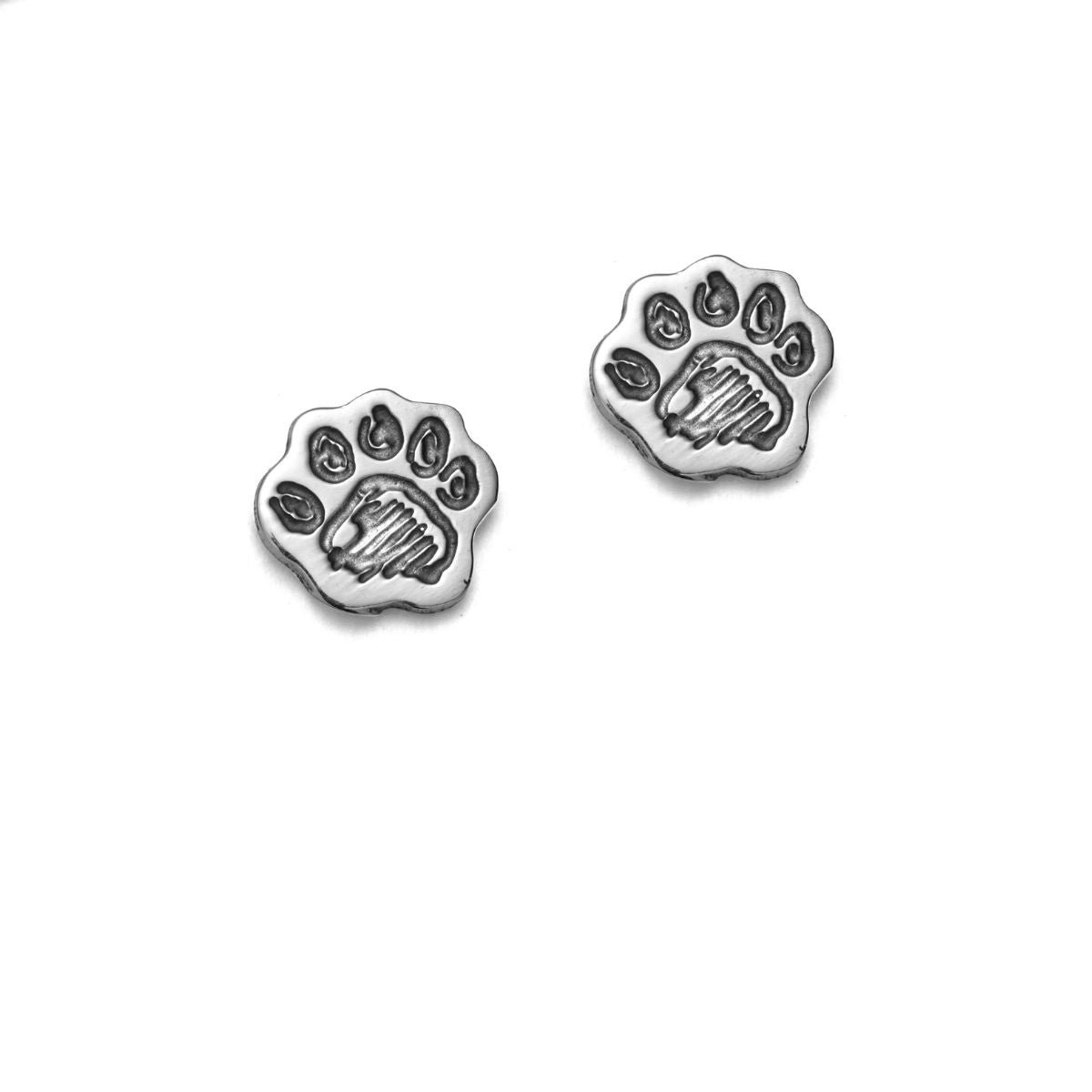 Paddington™ Paw Stud Earrings in sterling silver, handmade UK jewellery with engraved pawprint design, officially licensed Paddington gift.