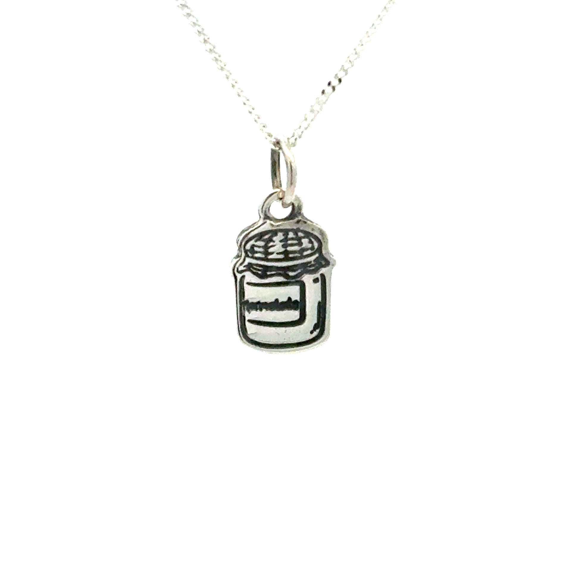 Sterling silver Paddington Bear marmalade jar pendant necklace – front view on white background