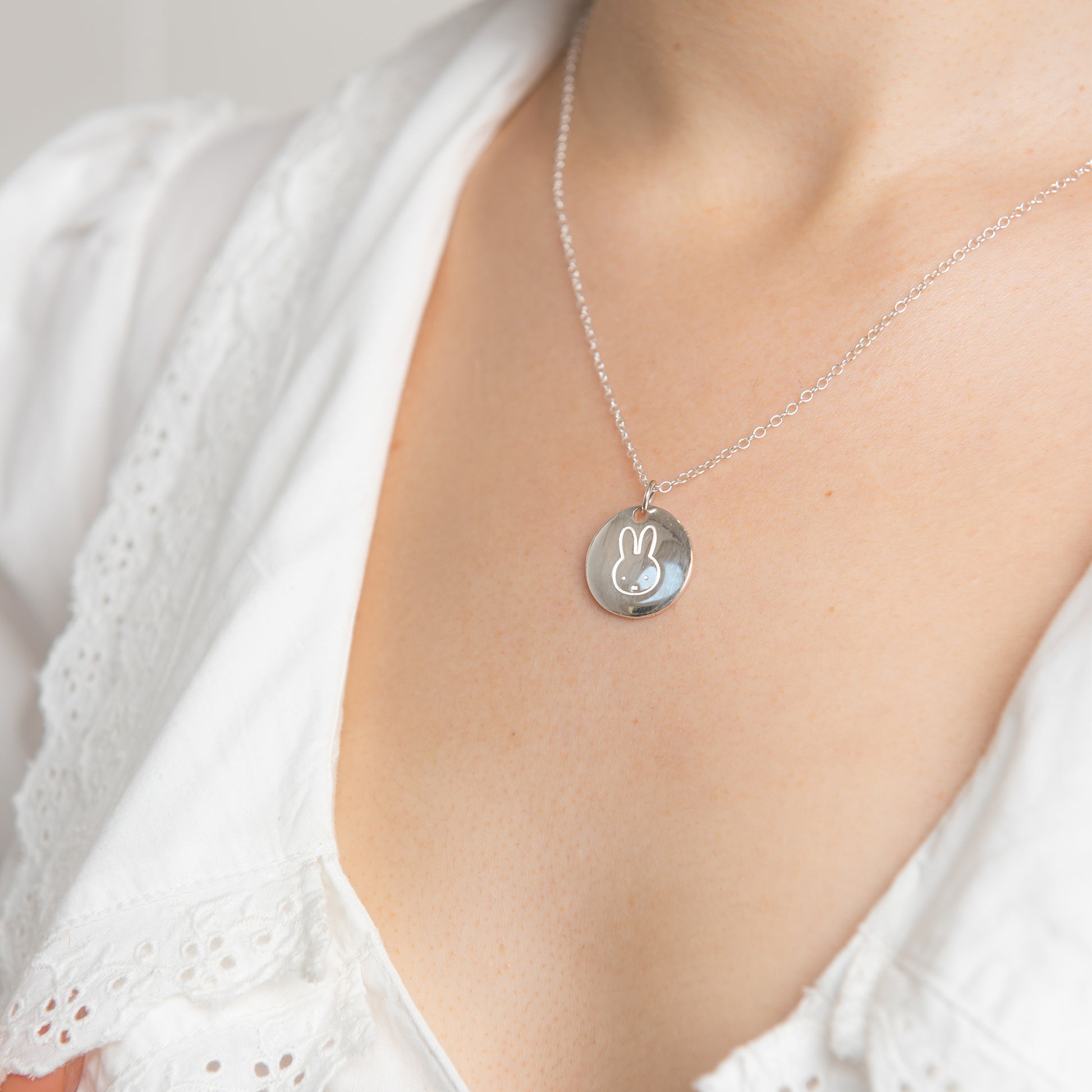 Sterling silver Miffy Large Disc Necklace with an etched Miffy head design. A charming and timeless piece for fans of Dick Bruna’s iconic character
