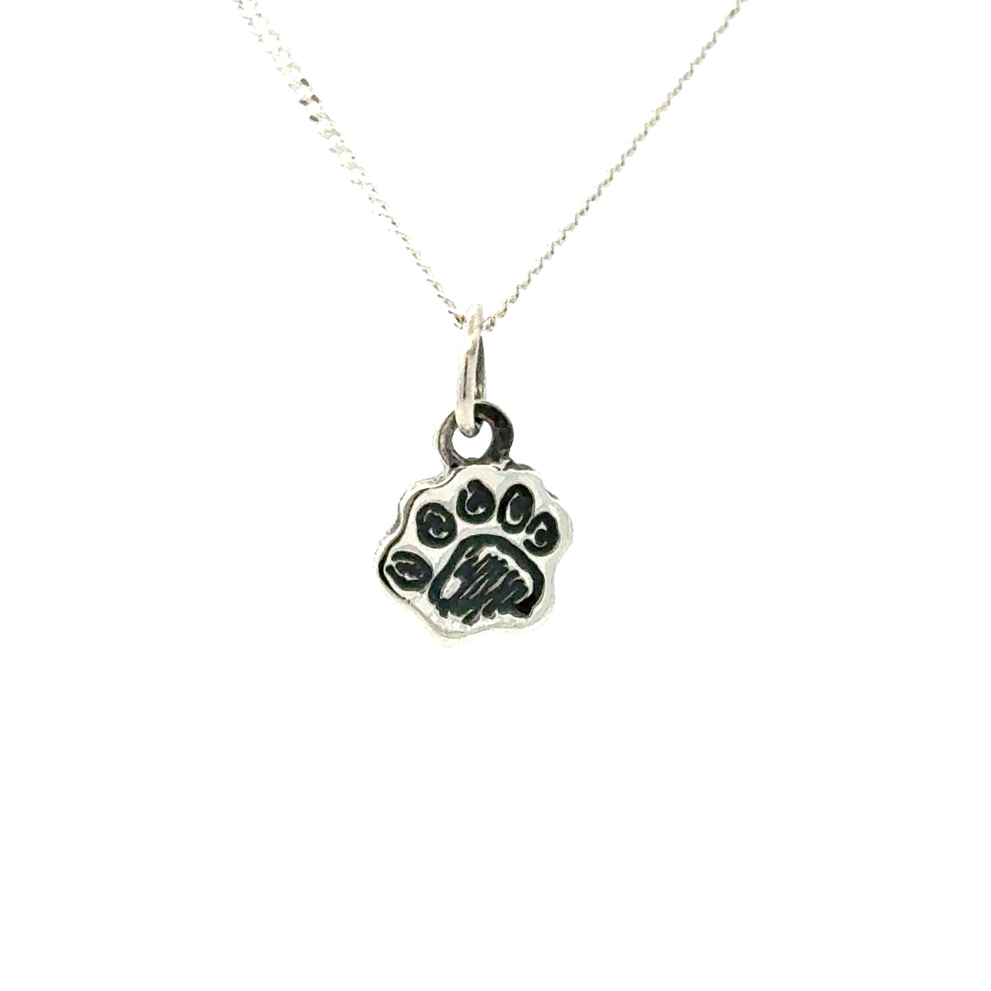 Sterling silver Paddington Bear pawprint charm necklace on white background – front view