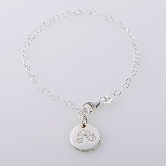 Sterling silver The Very Hungry Caterpillar charm bracelet, a first charm bracelet for kids, inspired by Eric Carle’s classic story.