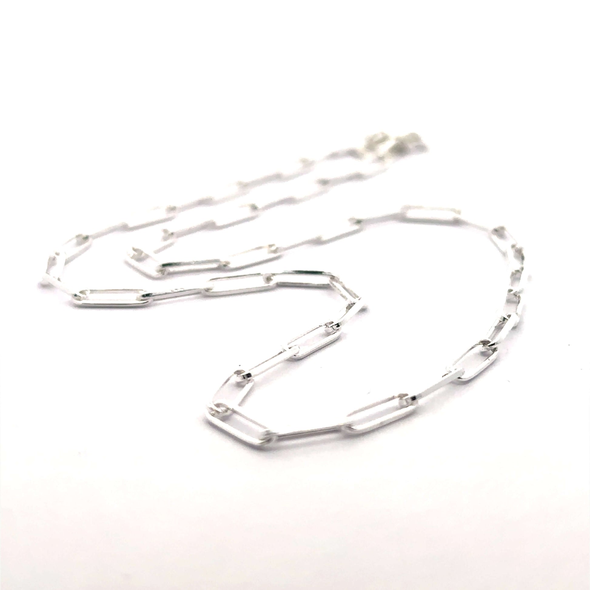 Close-up of the Sterling Silver Paperclip Necklace showing the detail and shine of the contemporary chain links.