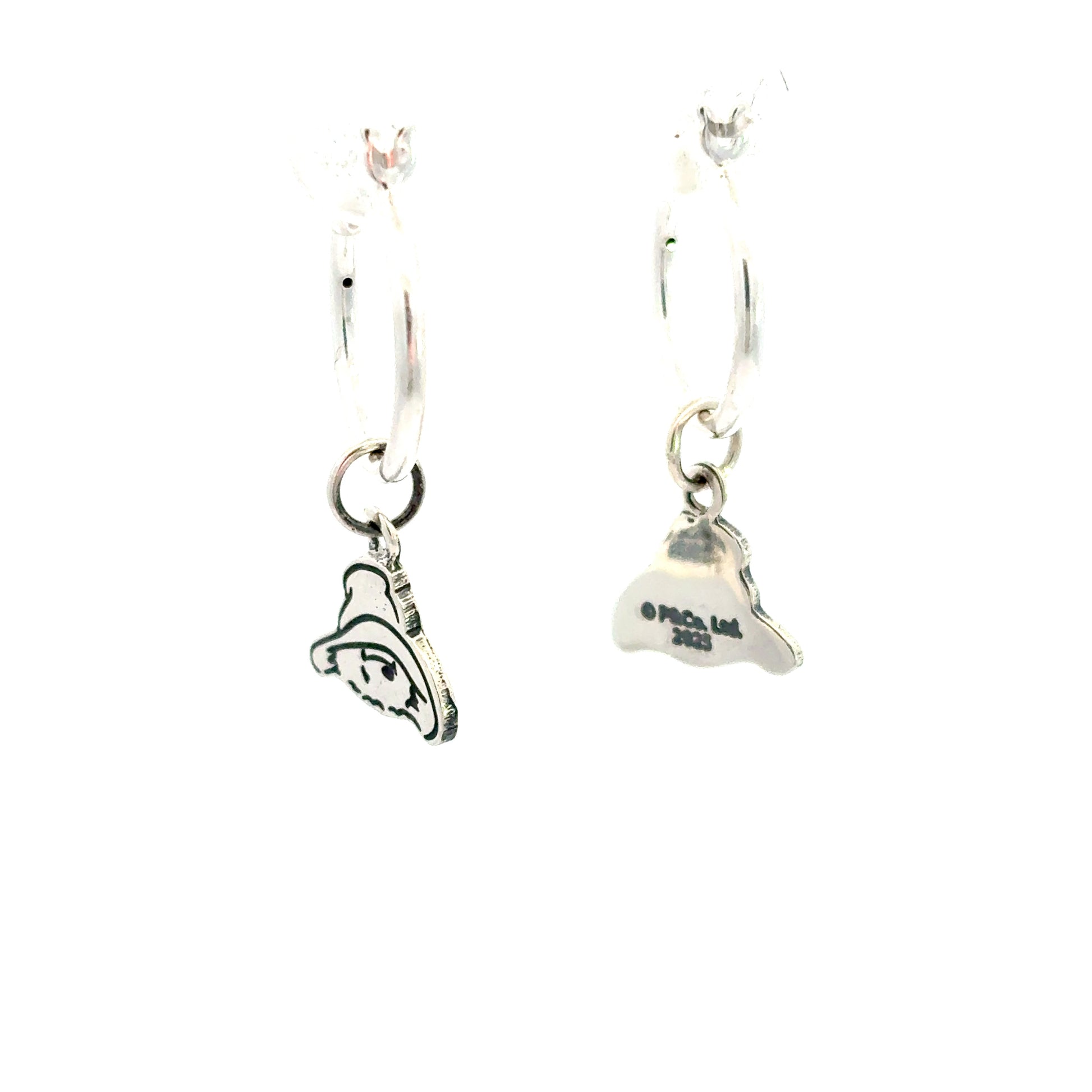 Side view of sterling silver Paddington Bear hoop earring showing the dangling charm and oxidised detailing