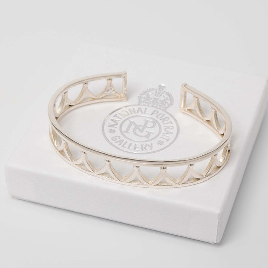 Front view of the Crown Cuff Bracelet in sterling silver, featuring a fretted tiara-inspired design with a polished finish.
