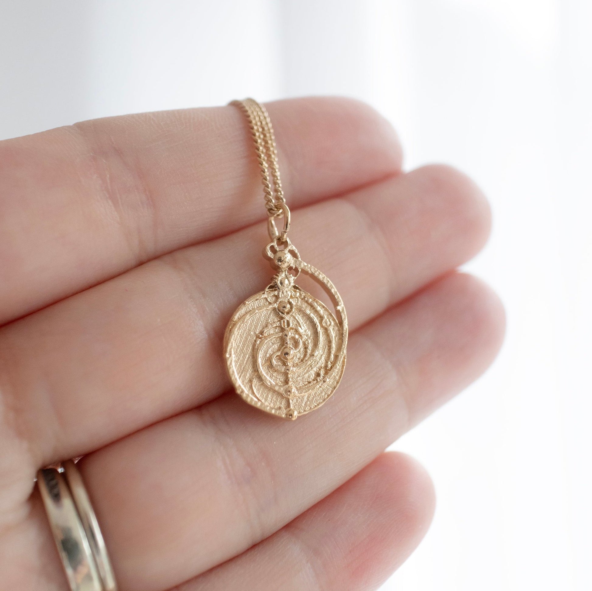 18ct Gold Vermeil Mystic Spiral Mandala Necklace, featuring the symbolic Master Time Spiral from The Dark Crystal. A stunning handcrafted tribute to Jim Henson’s dark fantasy world.