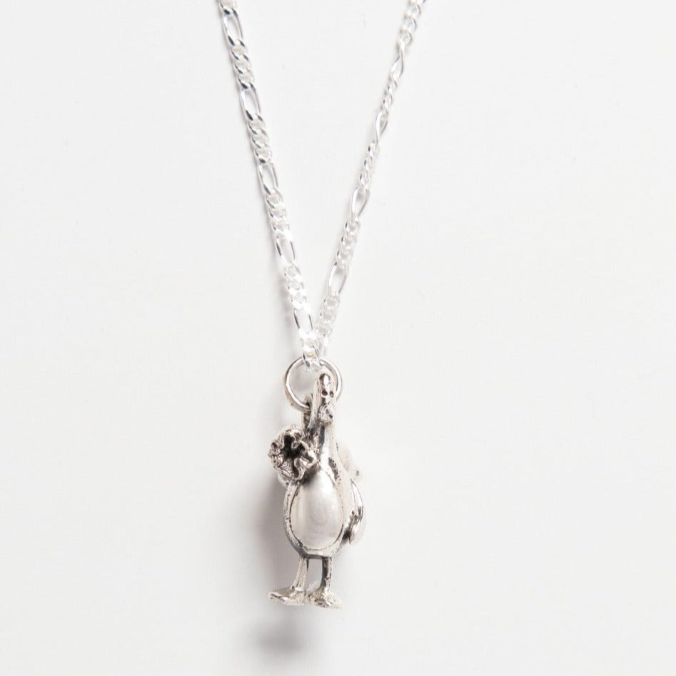 Feathers McGraw Necklace in sterling silver, featuring the cheeky penguin with a jewel heist sack. Officially licensed Wallace & Gromit collectible