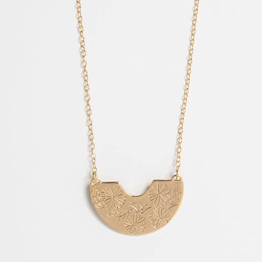 Frida Kahlo Marigold Creole Necklace in 18ct Gold Vermeil, featuring a semi-circle pendant with marigold engraving. Handmade jewellery for layering.