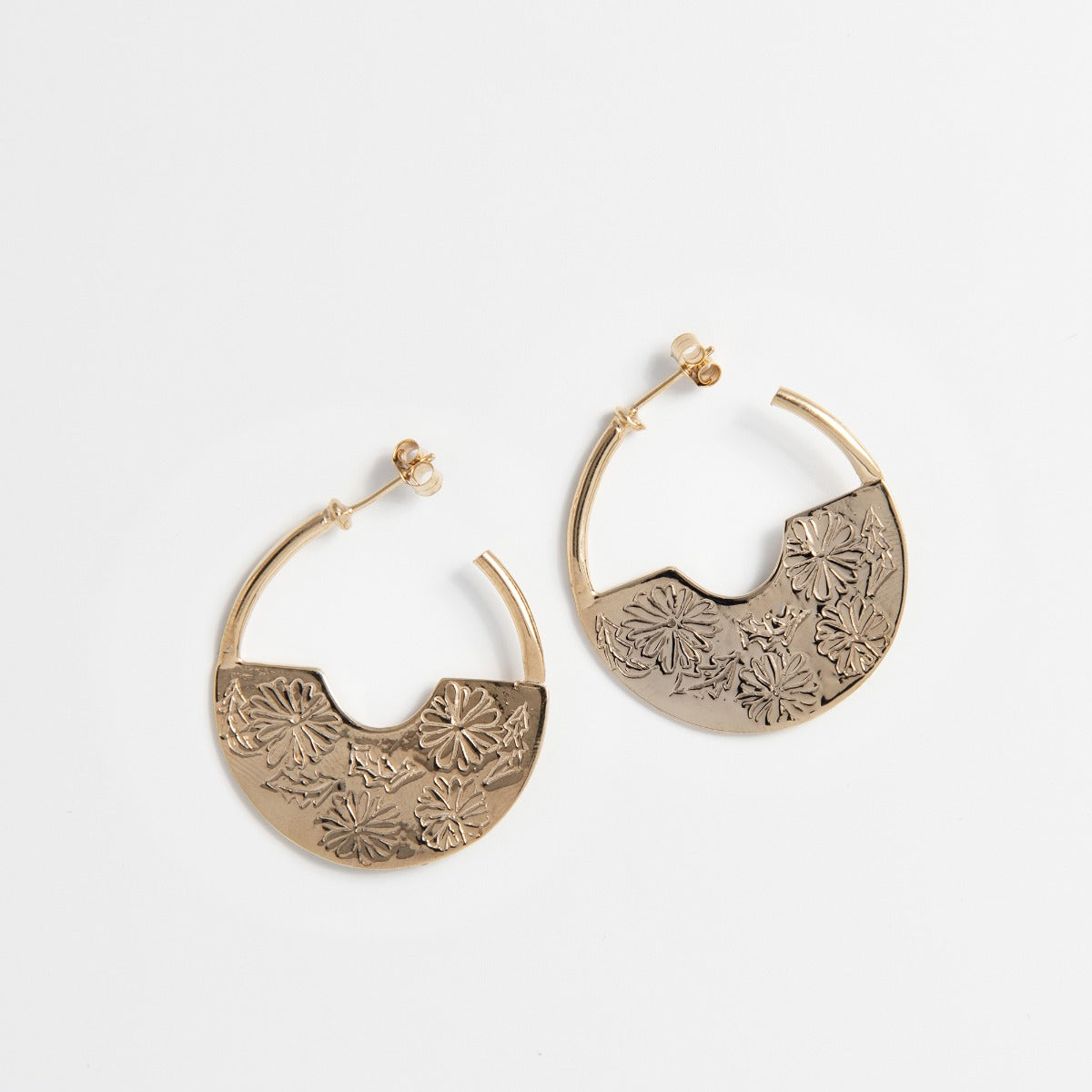 Frida Kahlo Marigold Creole Hoop Earrings in 18ct Gold Vermeil, featuring etched marigold flowers. Handmade statement jewellery.