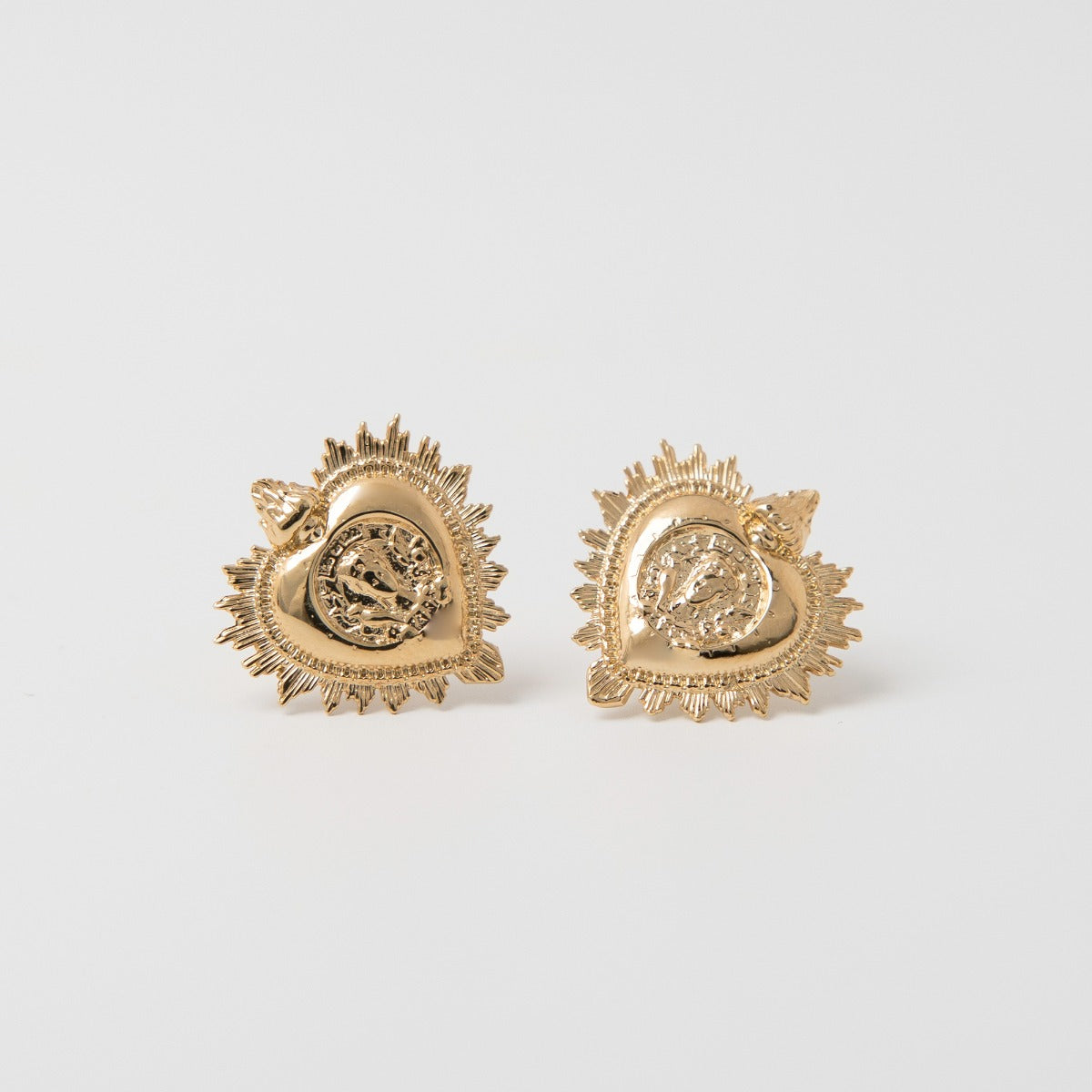 Front view of the Frida Kahlo Viva La Vida Heart Earrings in 18ct gold vermeil, showing the sacred heart design with Frida’s face and floral detailing
