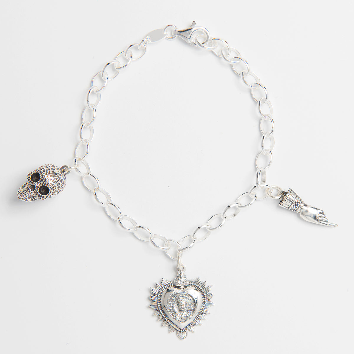 Frida Kahlo Viva La Vida Charm Bracelet with skull, heart, and pointing hand charms.
