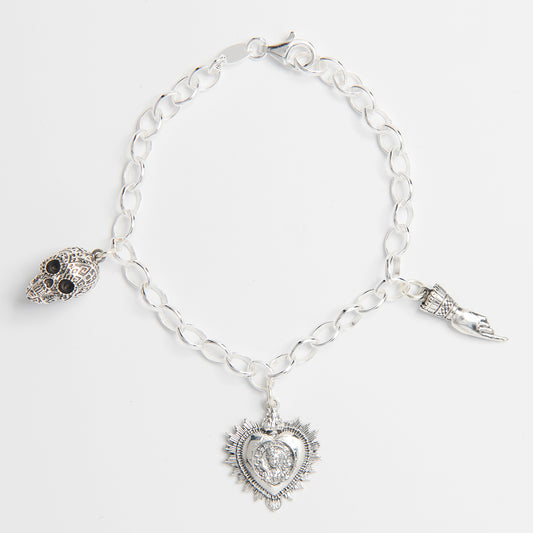 Frida Kahlo Viva La Vida Charm Bracelet with skull, heart, and pointing hand charms.