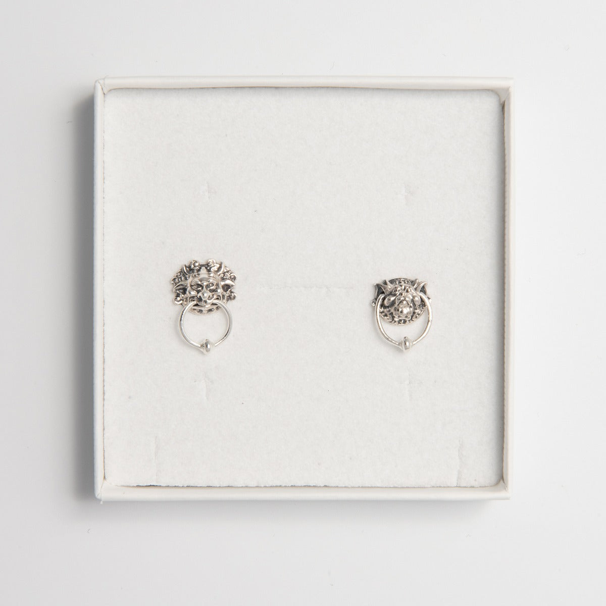 Handcrafted Sterling Silver Labyrinth Door Knocker Earrings with movable rings through mouth and ears. Inspired by the iconic knockers from Jim Henson’s Labyrinth. Unique, eco-friendly design for fans and collectors