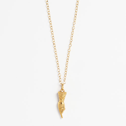 Licensed To Charm official Frida Kahlo Pointing Hand Necklace in 18ct gold vermeil, a symbolic jewellery gift for art lovers.
