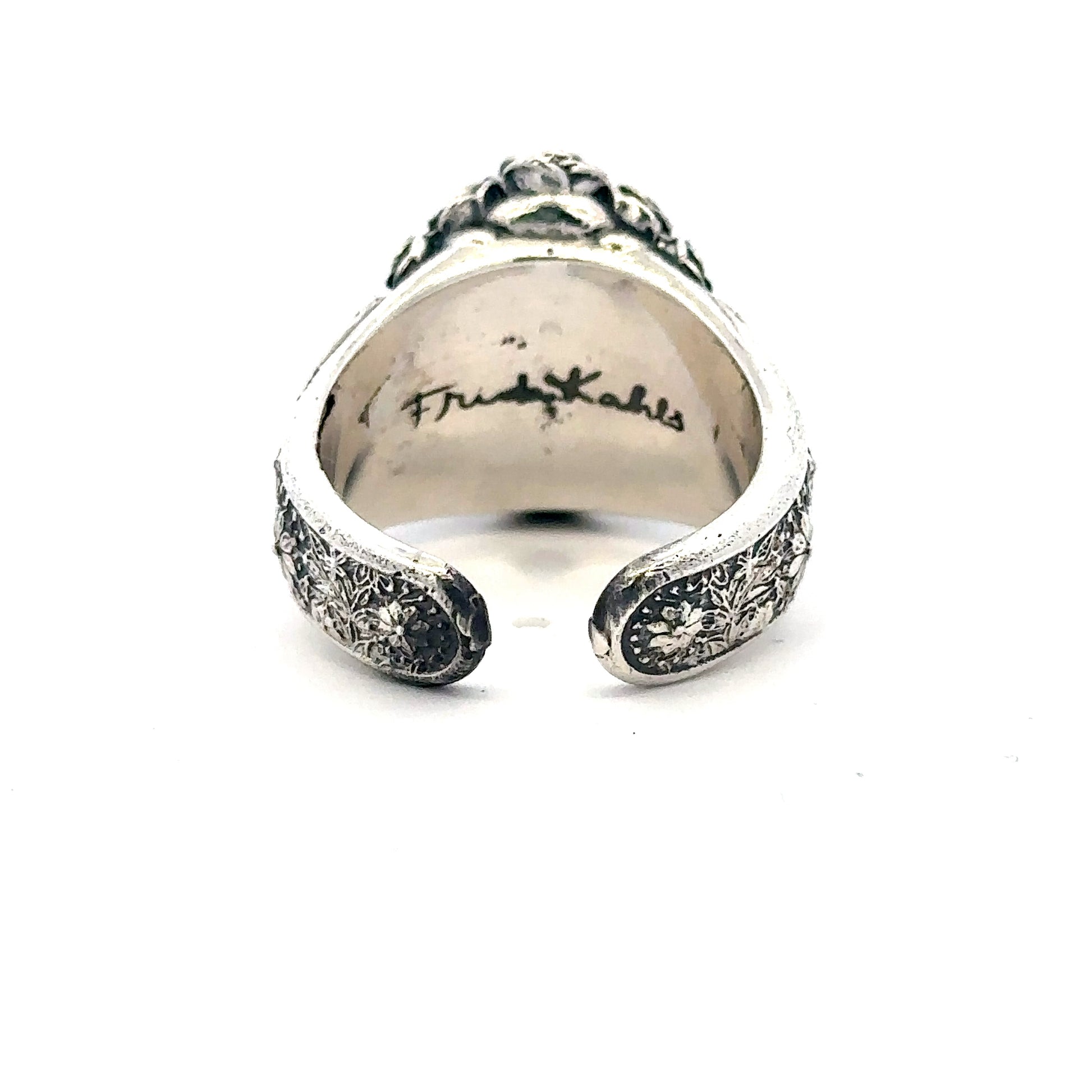 : Licensed To Charm Frida Kahlo Sugar Skull Ring showing engraved inner band