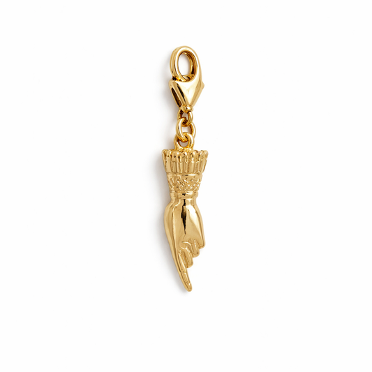 Licensed To Charm Frida-inspired pointing hand charm in gold vermeil with lobster clasp on a white background