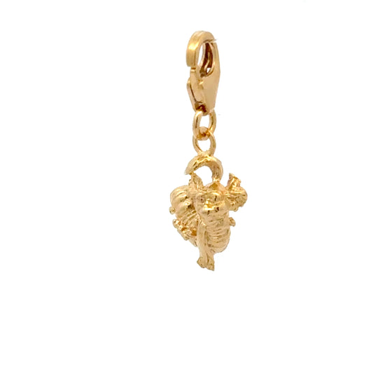 Licensed To Charm gold vermeil Labyrinth Worm Charm – angled view highlighting the hand-finished detailing on the Worm’s playful expression and delicately sculpted scarf.