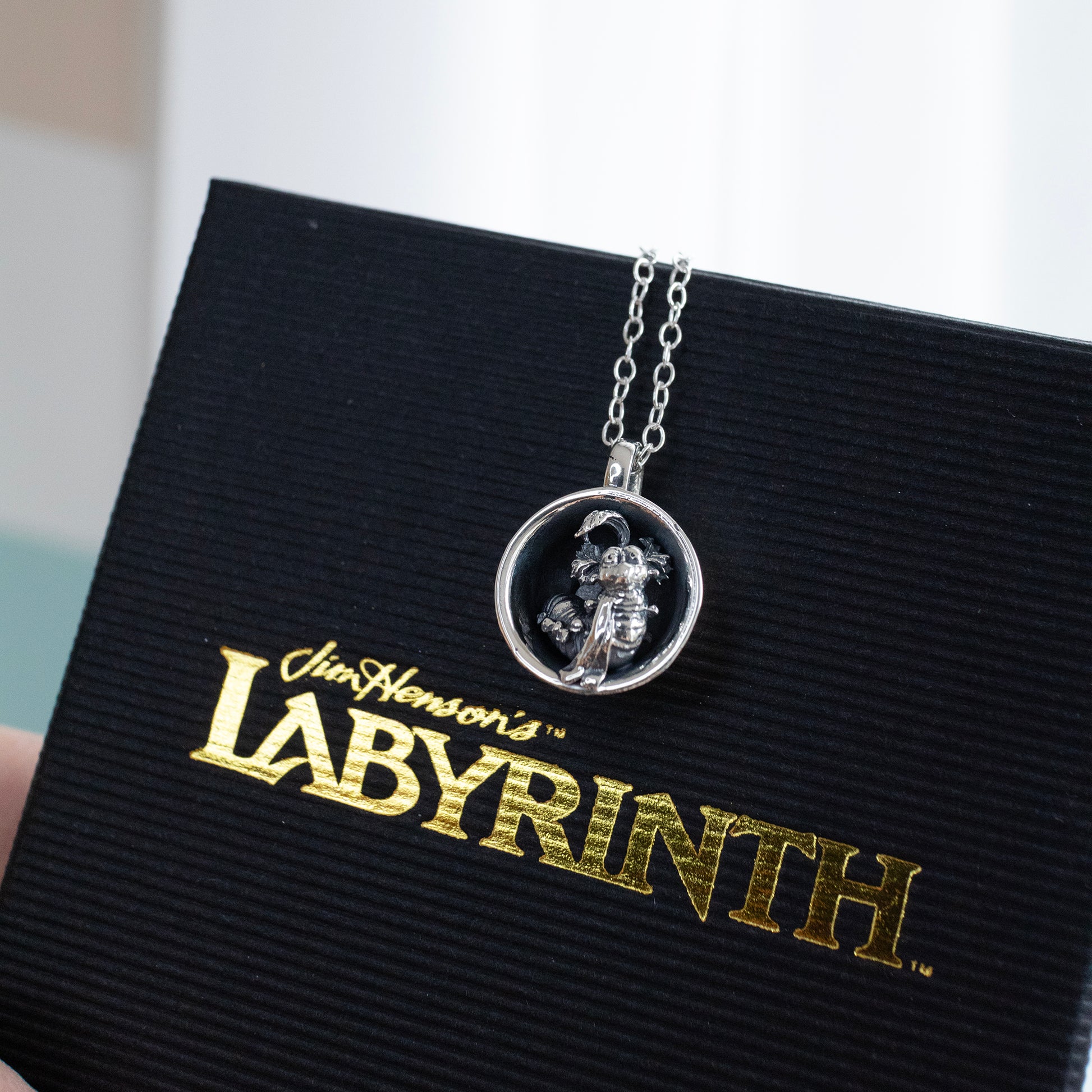 Licensed To Charm Labyrinth Worm in a Cup Necklace presented in branded Labyrinth jewellery gift box.