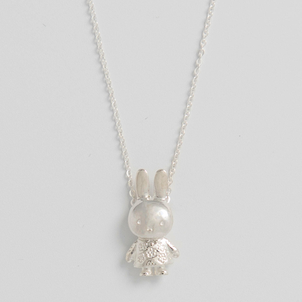 Licensed To Charm Miffy Flower Body Necklace in sterling silver, featuring a 3D Miffy charm with a delicate flower design. A charming gift for Miffy fans