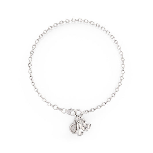 Licensed To Charm Miffy Charm Bracelet in sterling silver, featuring Miffy head, button, and tulip charms. Handcrafted from recycled silver, perfect for gifting