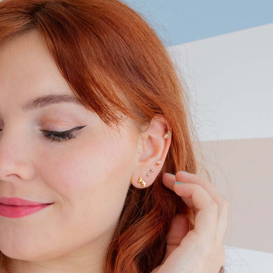 Model wearing Licensed To Charm Moomin Stud Earrings in 18ct gold vermeil