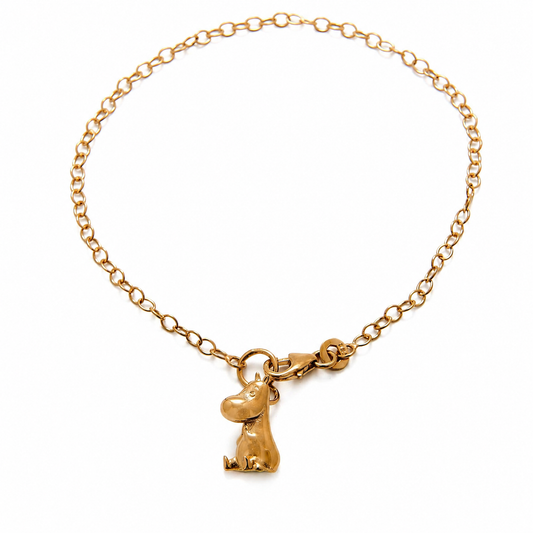 Official Moomintroll bracelet in 18ct gold vermeil, handmade in the UK by Licensed To Charm with a detailed Moomin charm and gold chain.