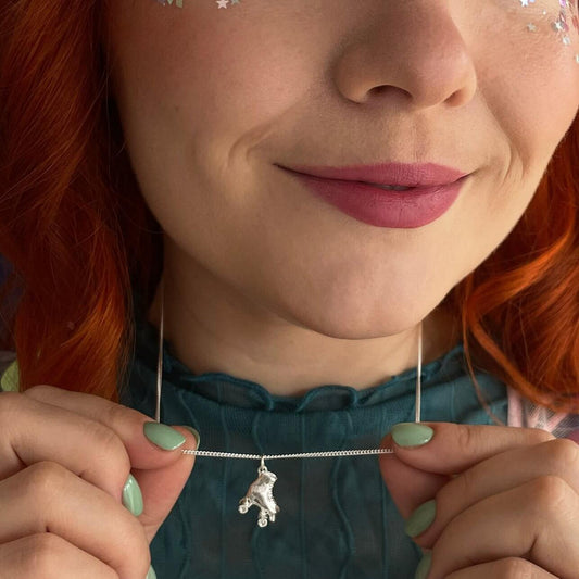 Licensed To Charm official Starlight Express roller skate necklace handmade in sterling silver