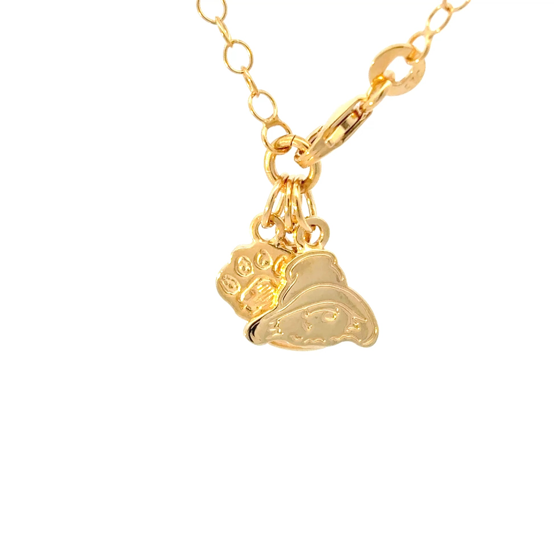 Licensed To Charm Close-up of Paddington™ Marmalade Jar charm on gold vermeil bracelet