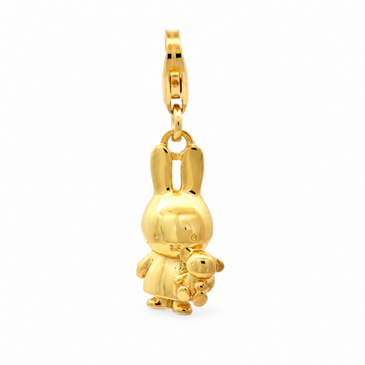 Front view of the Miffy Holding Teddy charm in 18ct gold vermeil showing Miffy's long ears, sweet expression and miniature teddy bear.