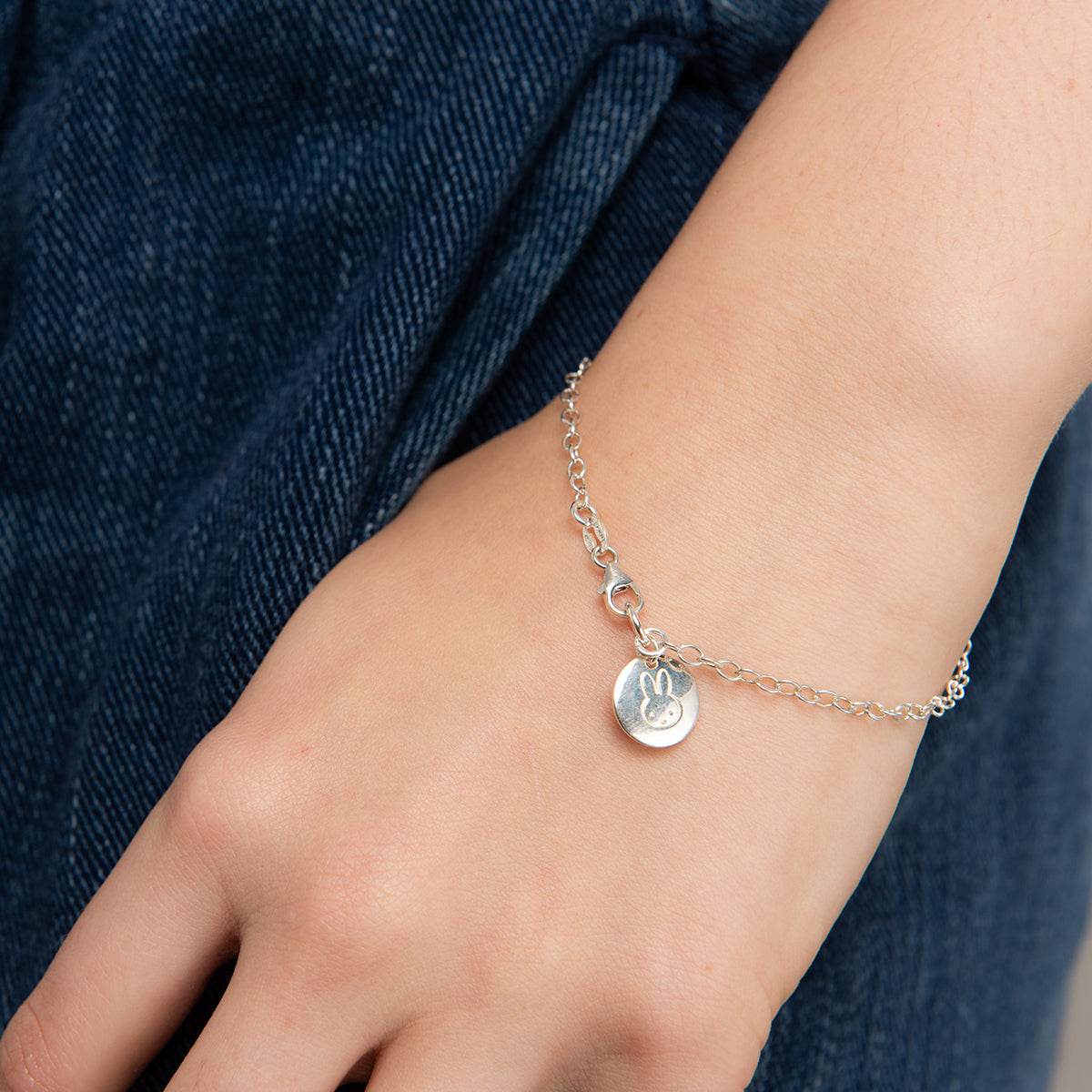 Miffy Disc Charm Bracelet in 18ct Gold Vermeil, worn on wrist — handmade and officially licensed, ideal for gifting and birthdays.