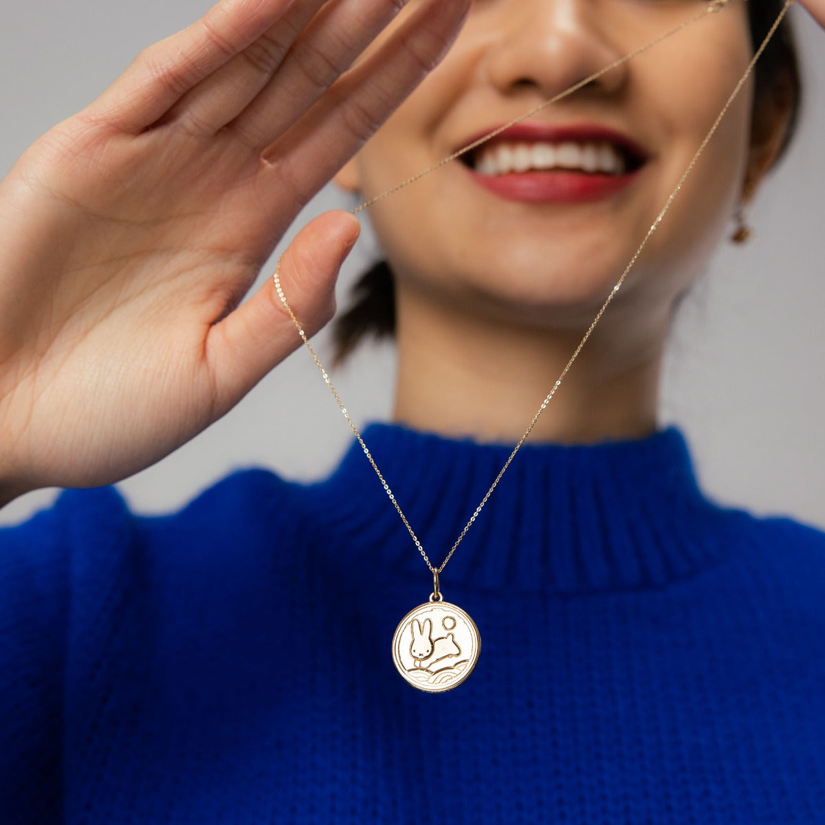Luxurious Miffy New Year Medallion Necklace with intricate double-sided detailing, including Miffy’s silhouette and moonlit field design