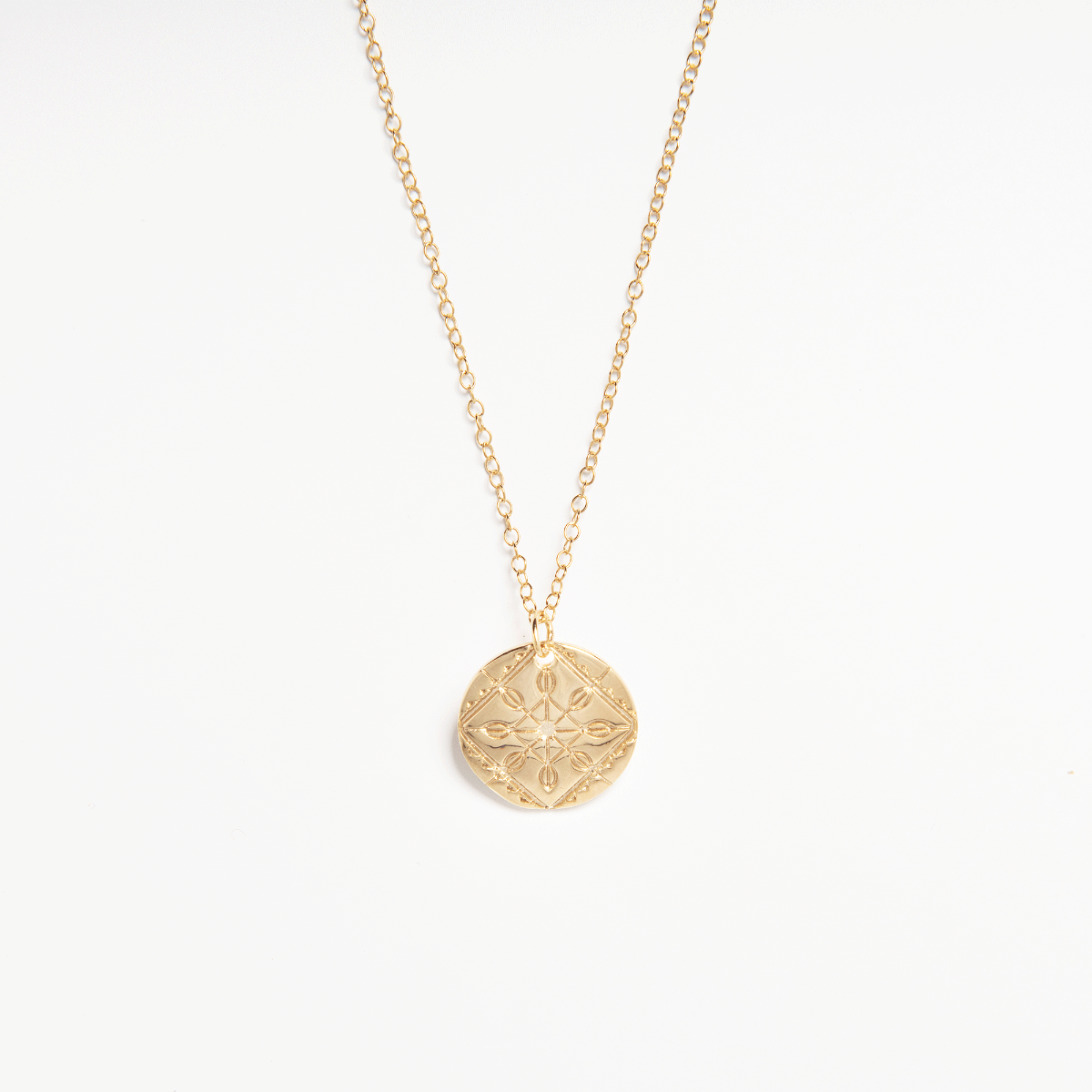 Front-facing view of the Solid Lace Necklace in 18ct gold vermeil, featuring an etched lace pattern inspired by Tudor fashion.