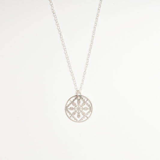 Front-facing view of the Lace Necklace in sterling silver, showcasing the intricate laser-etched lace pattern inspired by Elizabethan cartwheel ruffs.