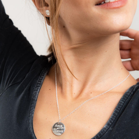 Front-facing view of the Amor et Virtute Necklace in sterling silver, featuring an engraved disc pendant with “Amor et Virtute” inscription.