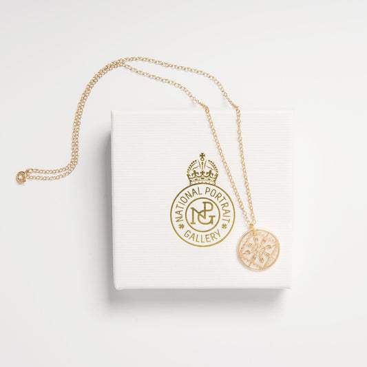 Close-up of the Lace Mother of Pearl Necklace pendant, highlighting the delicate lace pattern on the upper disc and the luminous mother of pearl beneath.