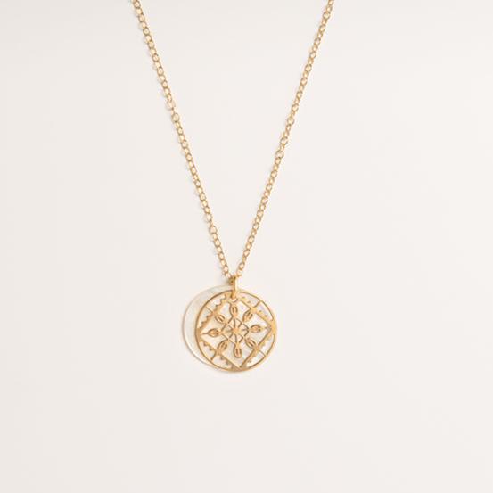 Front-facing view of the Lace Mother of Pearl Necklace in 18ct gold vermeil, featuring a double-disc pendant with intricate lace detailing and shimmering mother of pearl.