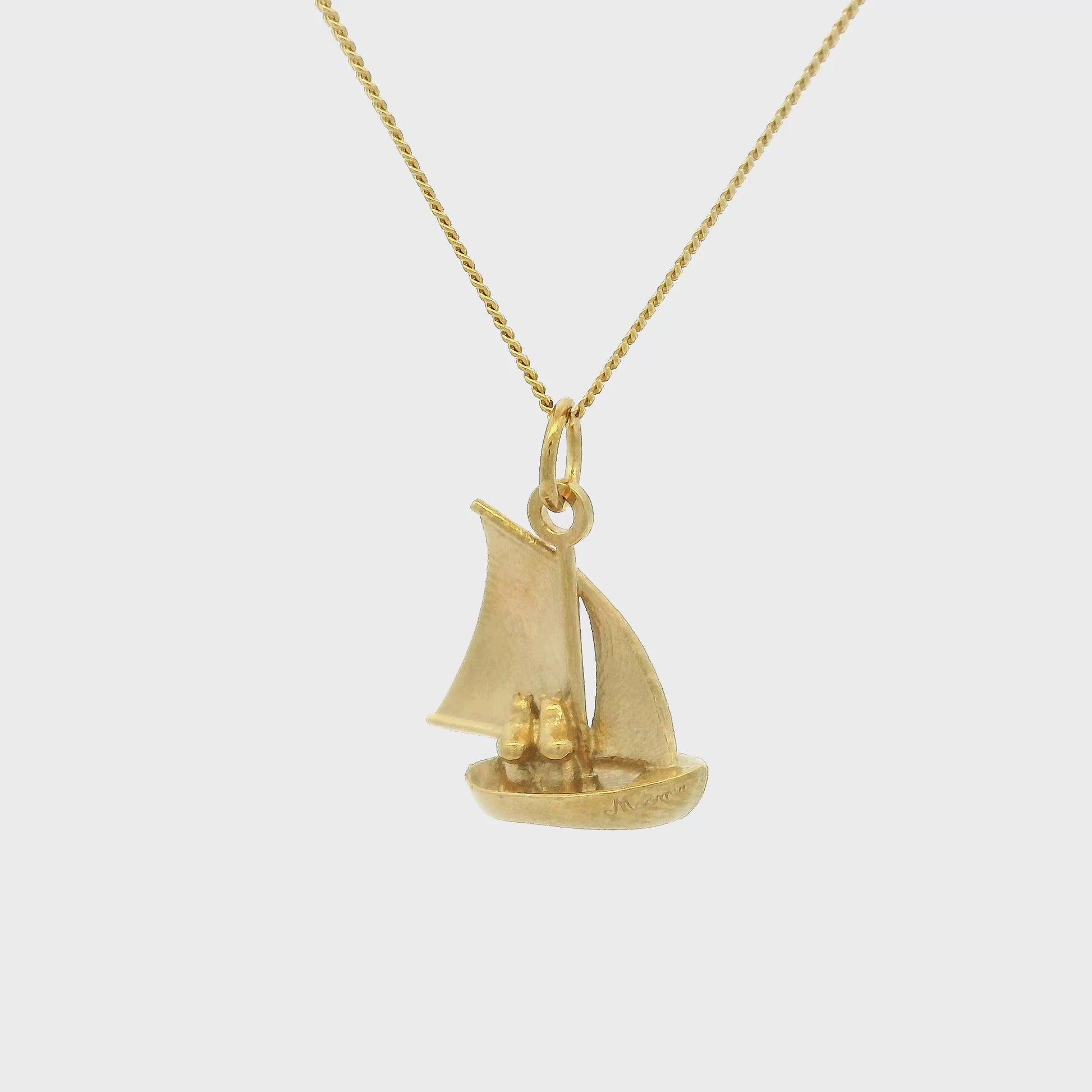 Moomins Sailing Boat gold vermeil necklace styled with seaside props – story-inspired Moomin gift