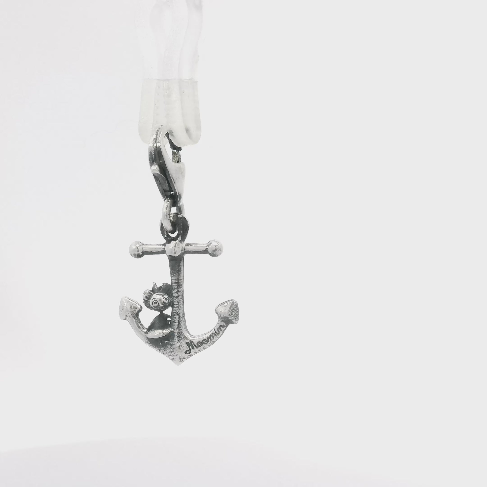 Sterling silver anchor charm turnaround showing 360-degree detail of Thingumy & Bob Moomin design and clip-on clasp