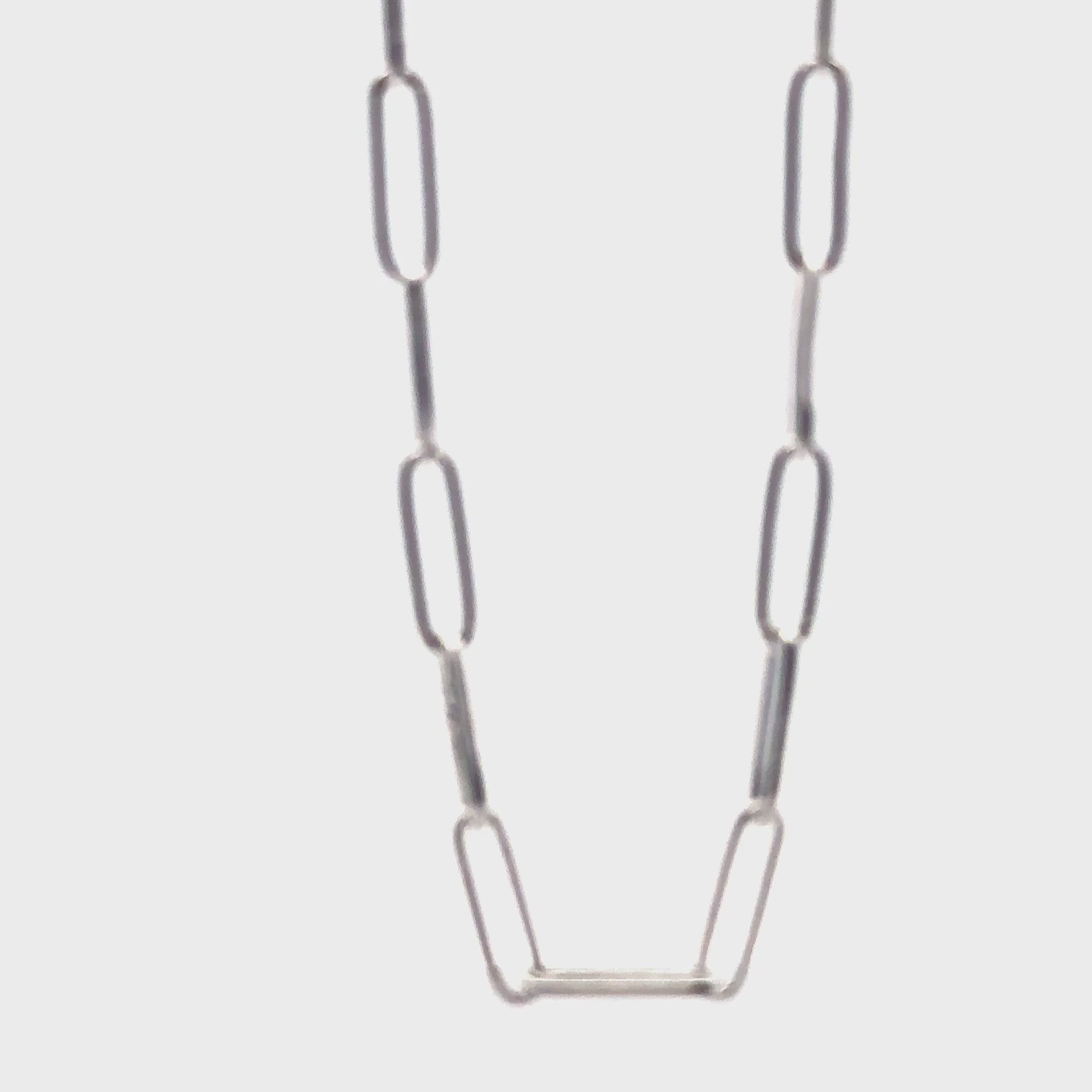 360-degree video turnaround of the Sterling Silver Paperclip Necklace, displaying the chain’s fluid movement and elegant link design
