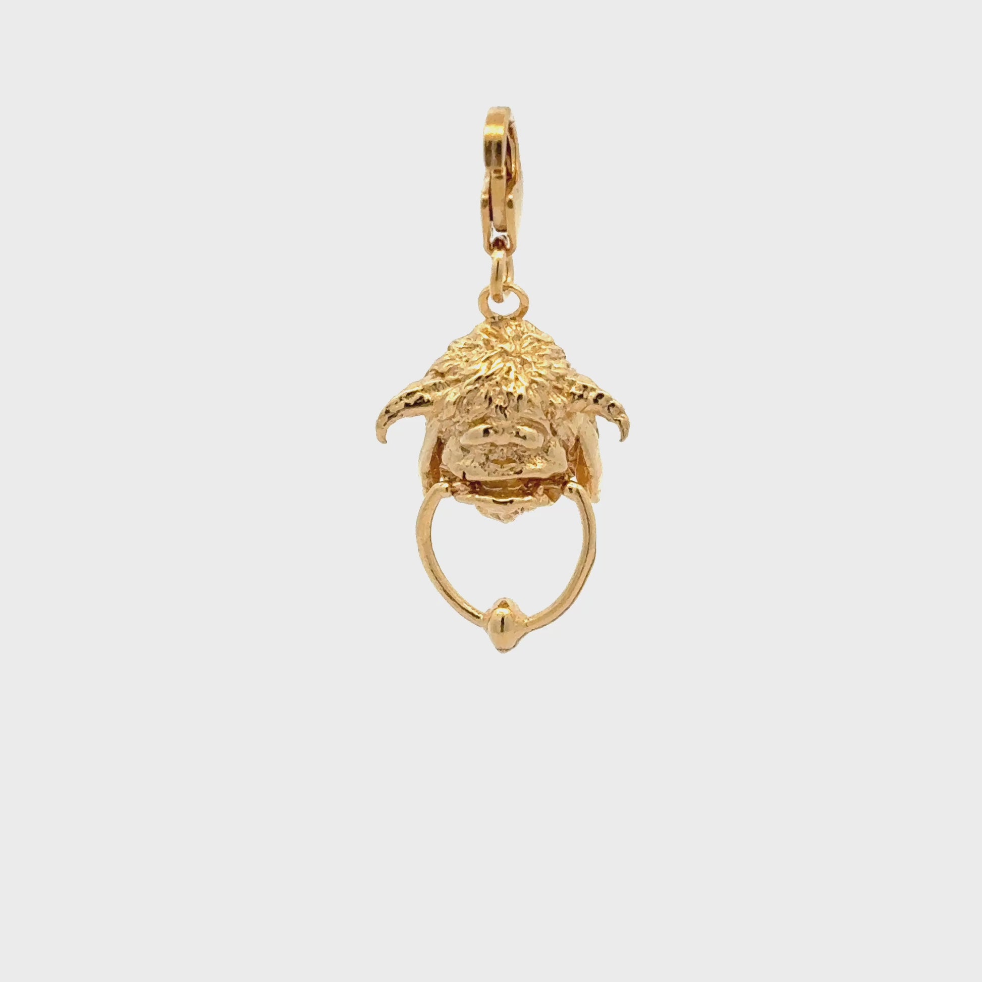 Licensed To Charm gold vermeil Labyrinth Ludo Clip-On Charm – lifestyle shot with other Labyrinth charms on a bracelet, capturing the nostalgic character collection.