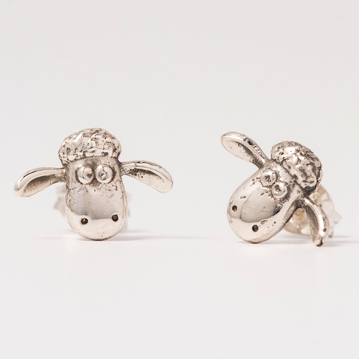 Shaun the Sheep Stud Earrings in sterling silver with oxidized detailing and butterfly back fittings.