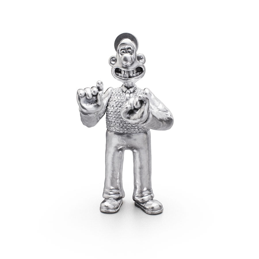 Close-up of the Standing Wallace Charm in sterling silver, highlighting the detailed texture and handcrafted finish.