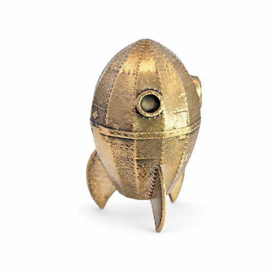 Rear view of the Wallace & Gromit miniature bronze rocket figurine showing the riveted panels, rocket fins and handcrafted texture.
