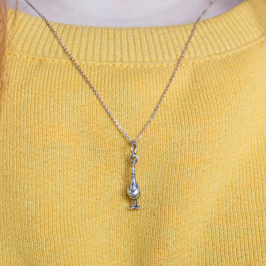Handcrafted Feathers McGraw Necklace in sterling silver, celebrating The Wrong Trousers. Perfect for fans and animation collectors.