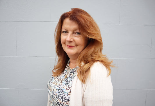 Maggie Calmels, founder of Licensed To Charm jewellery brand, creator of handmade sterling silver charms, necklaces and bracelets.